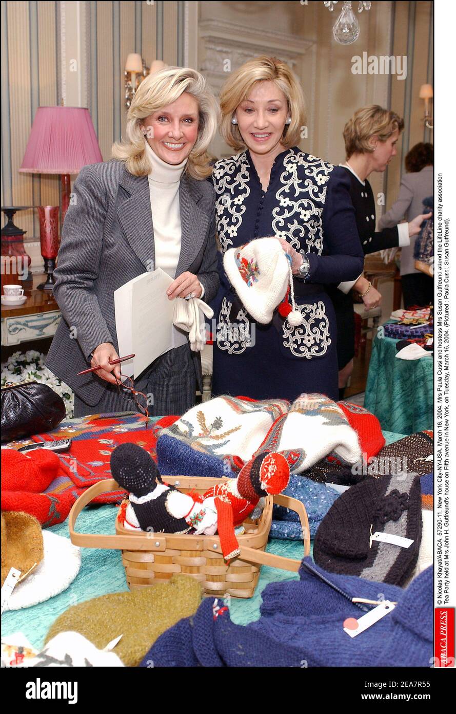 © Nicolas Khayat/ABACA. 57290-11. New York City-NY-USA. March 16, 2004. Mrs Paula Cussi and hostess Mrs Susan Gutfreund attend the LifeLine charity association Tea Party held at Mrs John H. Gutfreund's house on Fifth avenue in New York, on Tuesday, March 16, 2004. (Pictured : Paula Cussi, Susan Gutfreund). Stock Photo