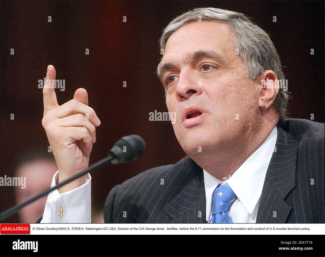 © Olivier Douliery/ABACA. 57636-5. Washington-DC-USA, March 24, 2004. Director of the CIA George tenet, testifies before the 9-11 commission on the formulation and conduct of U.S counter terrorism policy, March 24, 2004, in Washington DC. Stock Photo