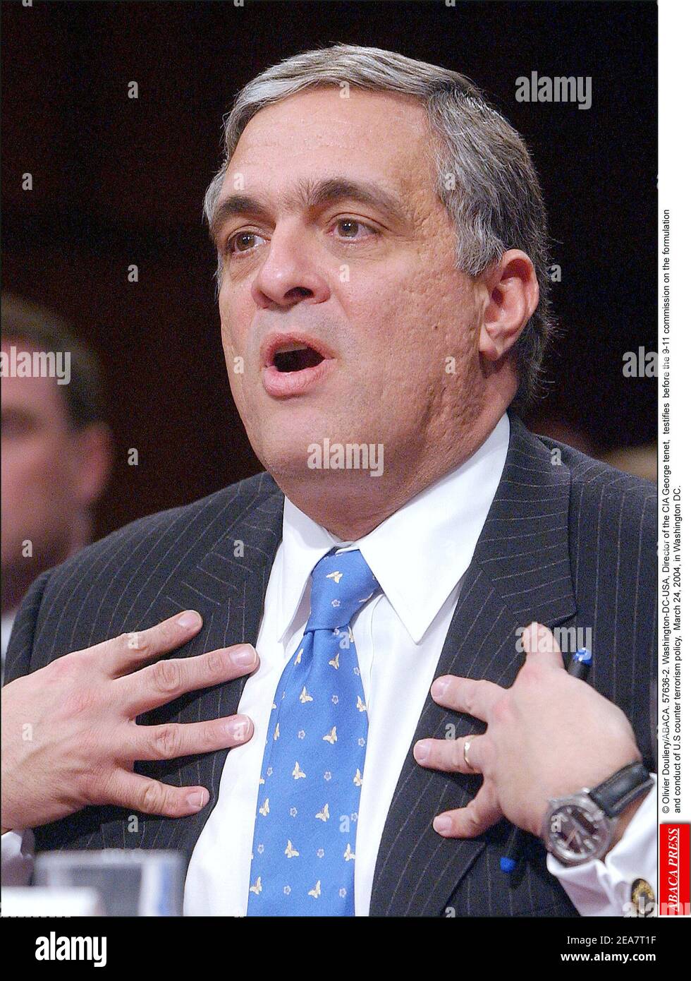 © Olivier Douliery/ABACA. 57636-2. Washington-DC-USA, March 24, 2004. Director of the CIA George tenet, testifies before the 9-11 commission on the formulation and conduct of U.S counter terrorism policy, March 24, 2004, in Washington DC. Stock Photo