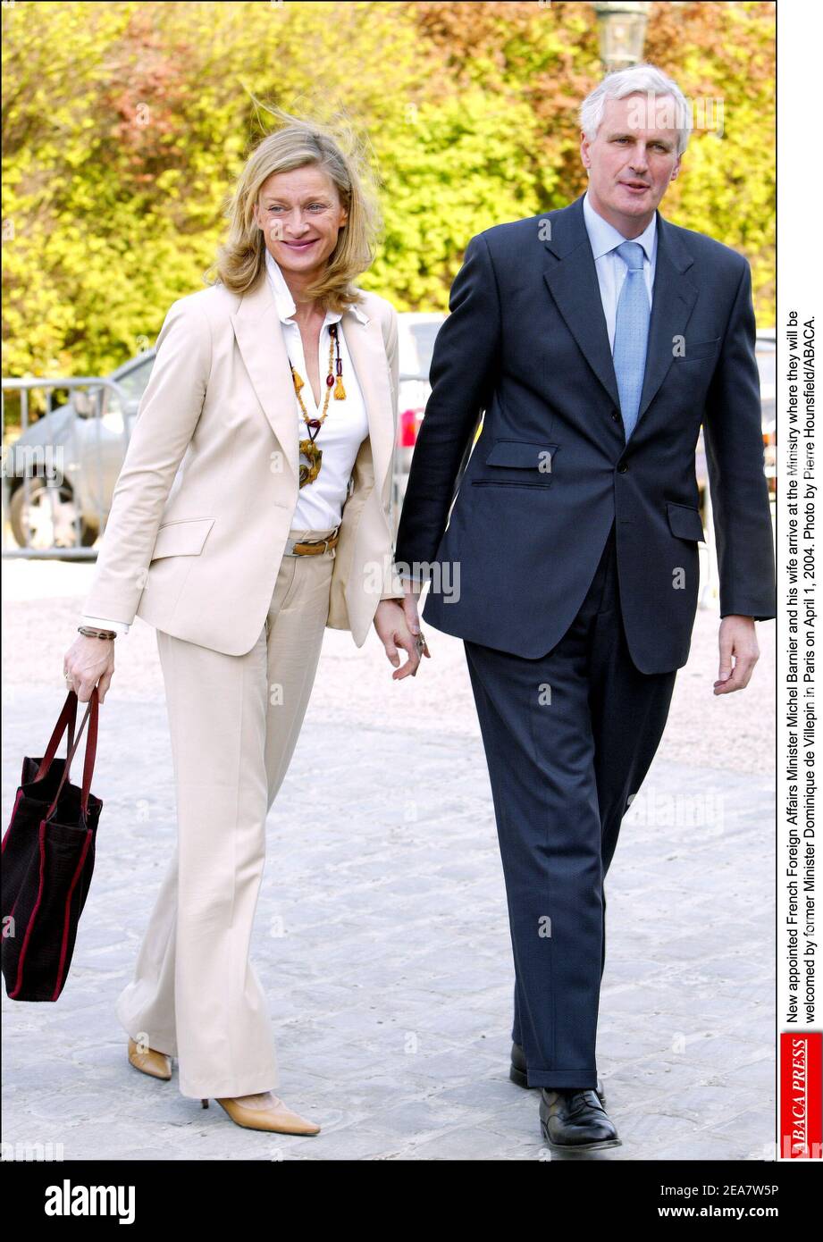 New appointed French Foreign Affairs Minister Michel Barnier and his wife  arrive at the Ministry where they will be welcomed by former Minister  Dominique de Villepin in Paris on April 1, 2004.