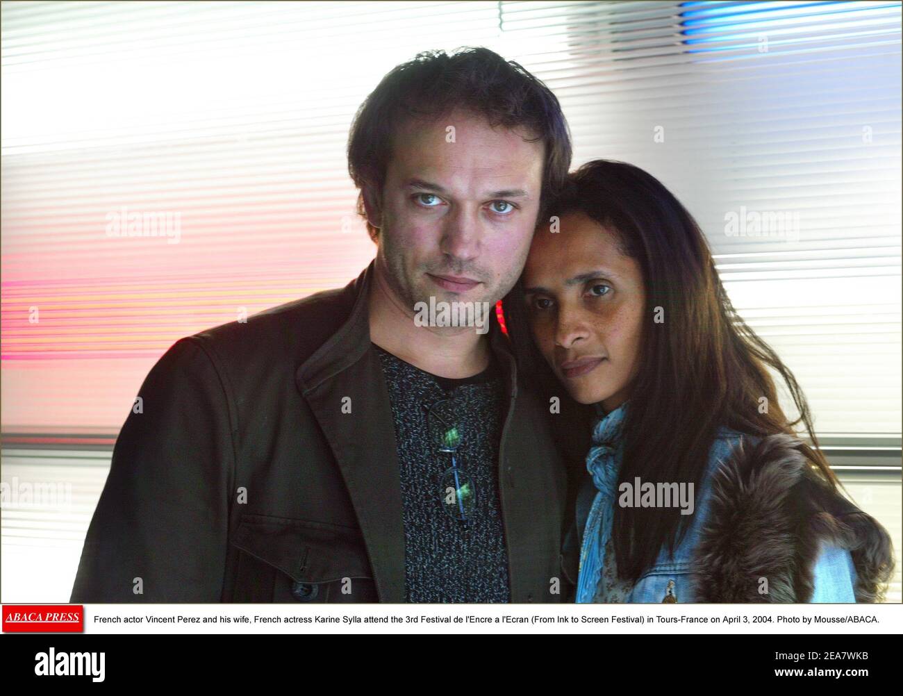 Swiss actor Vincent Perez and his wife, French actress Karine Sylla attend the 3rd Festival de l'Encre a l'Ecran (From Ink to Screen Festival) in Tours-France on April 3, 2004. Photo by Mousse/ABACA. Stock Photo