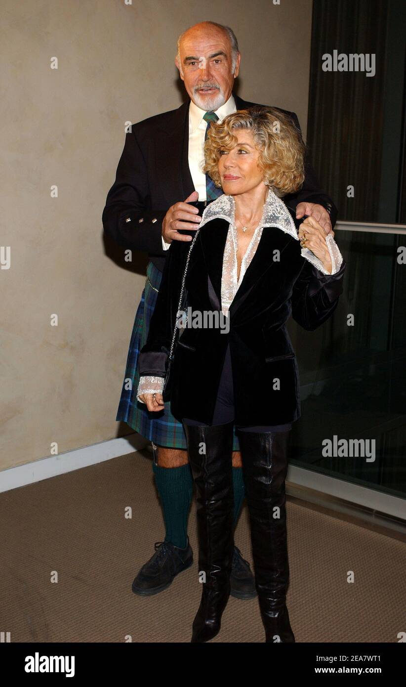 Sir Sean Connery and his wife Micheline Roquebrune arrive at the Dressed To Kilt party, held at Sotheby's in New York, on Monday, April 5, 2004. (Pictured : Sean Connery, Micheline Roquebrune). Photo by Nicolas Khayat/ABACA. Stock Photo