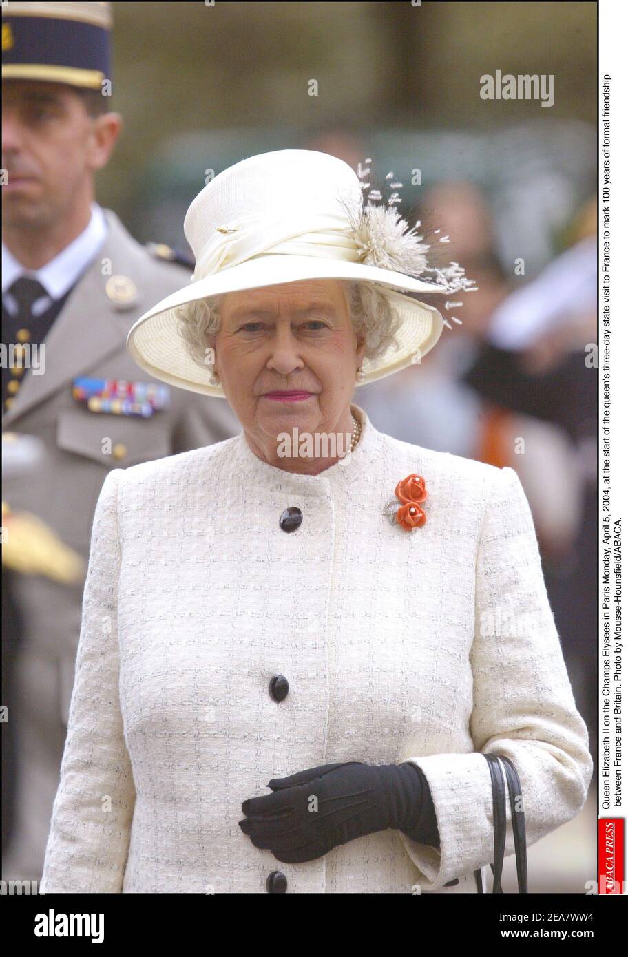 Britian's Queen Elizabeth II on the Champs Elysees in Paris Monday, April 5, 2004, at the start of the queen's three-day state visit to France to mark 100 years of formal friendship between France and Britain. Photo by Mousse-Hounsfield/ABACA. Stock Photo