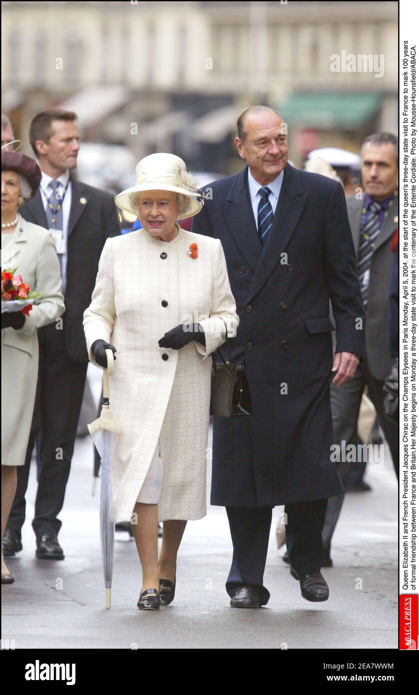 Britian's Queen Elizabeth II and French President Jacques Chirac on the Champs Elysees in Paris Monday, April 5, 2004, at the start of the queen's three-day state visit to France to mark 100 years of formal friendship between France and Britain.Her Majesty begins on Monday a three-day state visit to mark the centenary of the Entente Cordiale. Photo by Mousse-Hounsfield/ABACA. Stock Photo