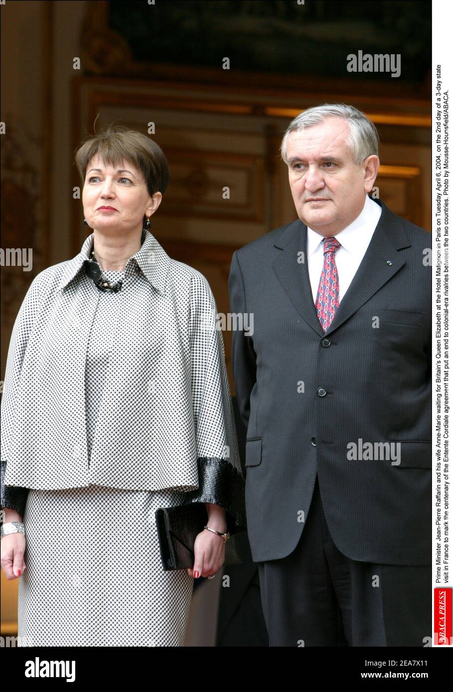 Prime Minister Jean-Pierre Raffarin and his wife Anne-Marie waiting for  Britain's Queen Elizabeth at the Hotel Matignon in Paris on Tuesday April  6, 2004, on the 2nd day of a 3-day state