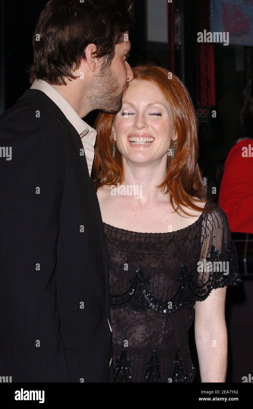 Julianne Moore and her husband Bart Fruendlich arrive at the World Premiere  for Laws of Attraction, held at the Loews Astor Plaza in New york, on  Thursday, April 22, 2004. (Pictured :, image size:861x1390