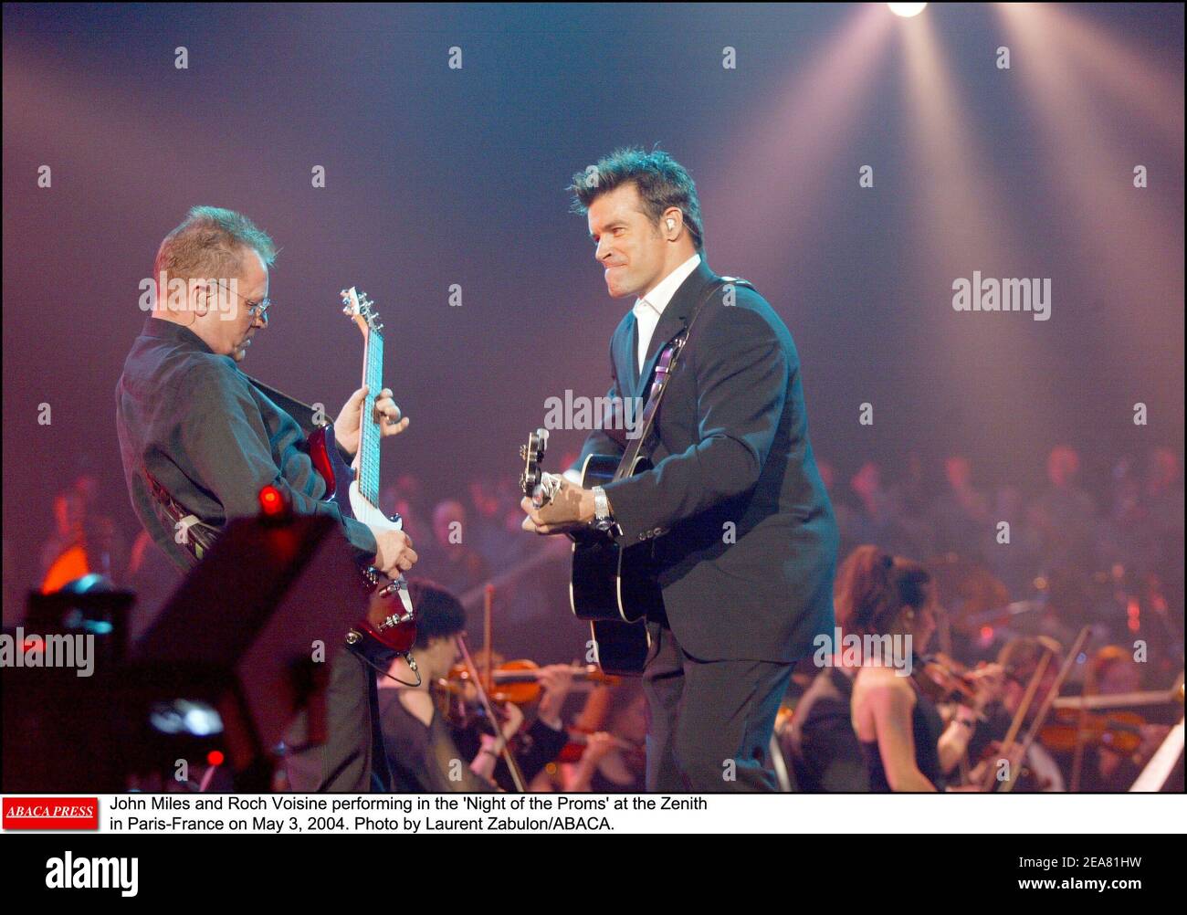 John Miles and Roch Voisine performing in the 'Night of the Proms' at the Zenith in Paris-France on May 3, 2004. Photo by Laurent Zabulon/ABACA. Stock Photo