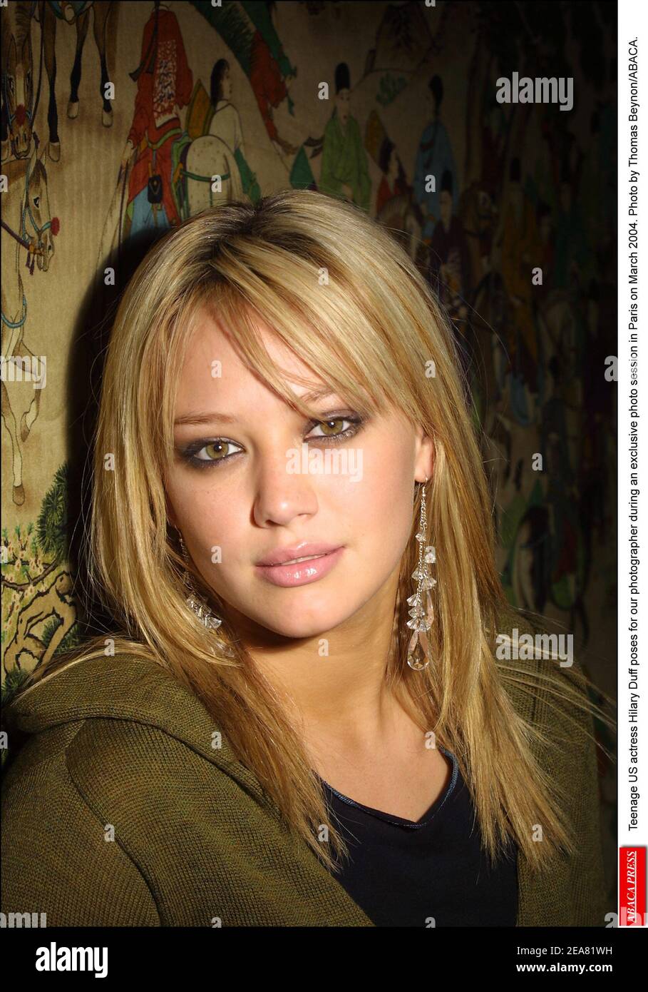 Teenage US actress Hilary Duff poses for our photographer during an exclusive photo session in Paris on March 2004. Photo by Thomas Beynon/ABACA. Stock Photo