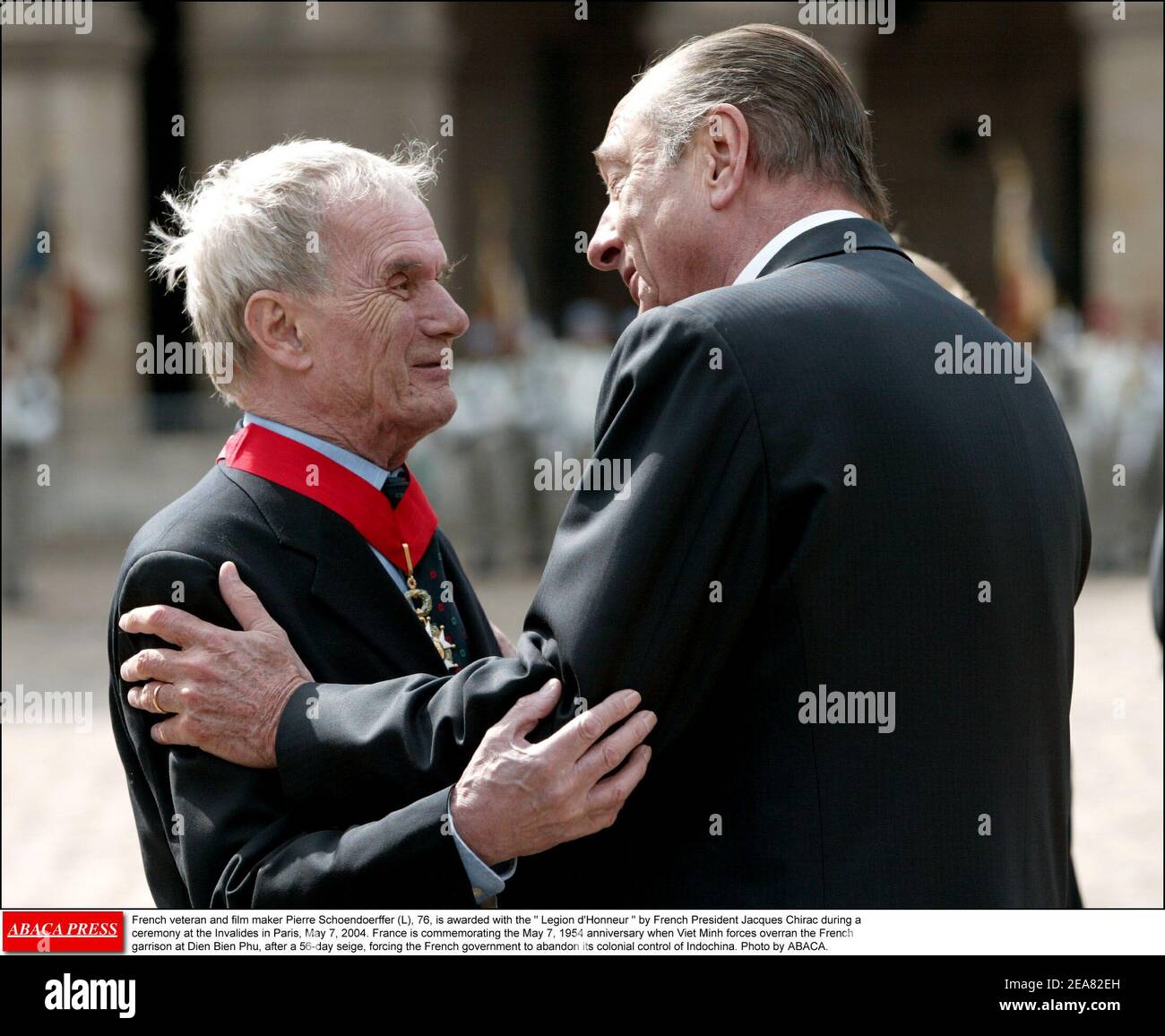 French veteran and film maker Pierre Schoendoerffer (L), 76, is awarded with the Legion d'Honneur by French President Jacques Chirac during a ceremony at the Invalides in Paris, May 7, 2004. France is commemorating the May 7, 1954 anniversary when Viet Minh forces overran the French garrison at Dien Bien Phu, after a 56-day seige, forcing the French government to abandon its colonial control of Indochina. Photo by ABACA. Stock Photo