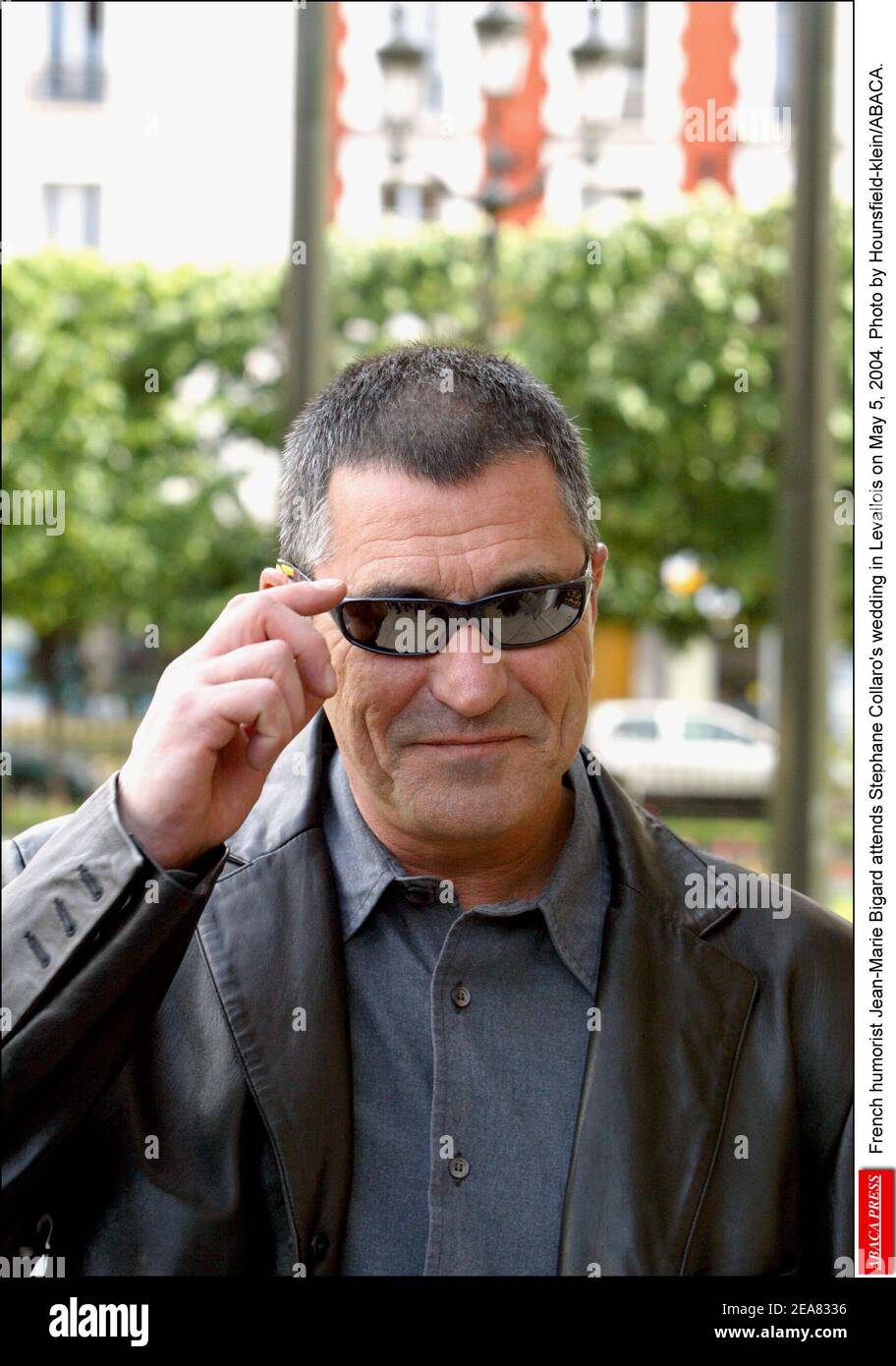 French humorist Jean-Marie Bigard attends Stephane Collaro's wedding in Levallois on May 5, 2004. Photo by Hounsfield-klein/ABACA. Stock Photo