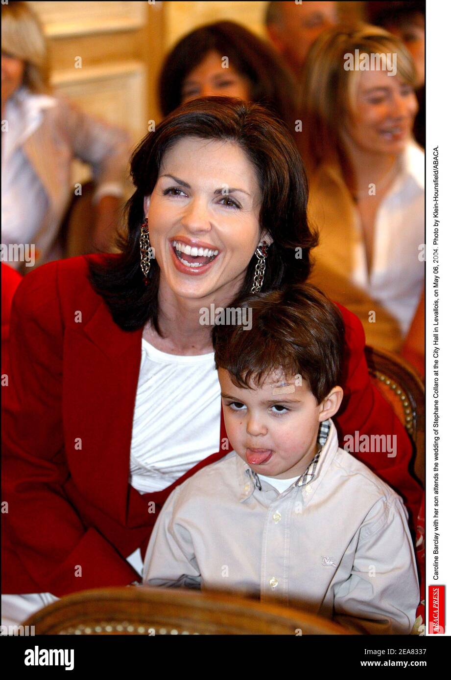 Caroline Barclay with her son attends the wedding of Stephane Collaro at the City Hall in Levallois, on May 06, 2004. Photo by Klein-Hounsfield/ABACA. Stock Photo