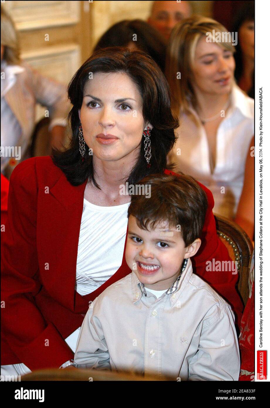 Caroline Barclay with her son attends the wedding of Stephane Collaro at the City Hall in Levallois, on May 06, 2004. Photo by Klein-Hounsfield/ABACA. Stock Photo