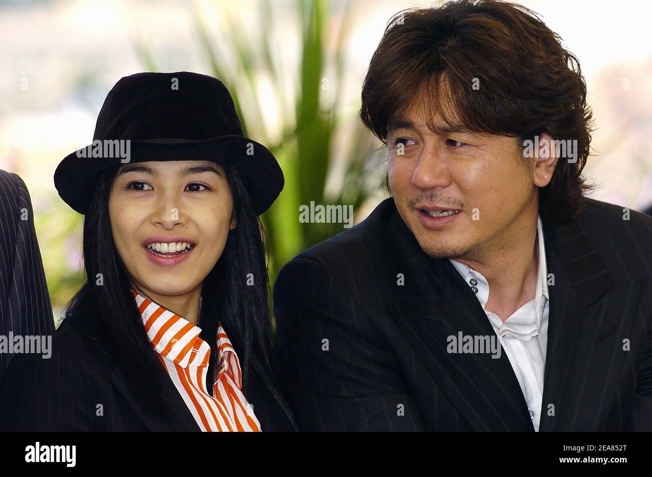 Jie-Tae Yu, Min-Sik Choi poses for photographers during the photocall for 'Old  Boy' during the 57th Cannes film Festival in France. May 15, 2004  (Pictured: Jie-Tae Yoo, Min-Sik Choi ) Photo by
