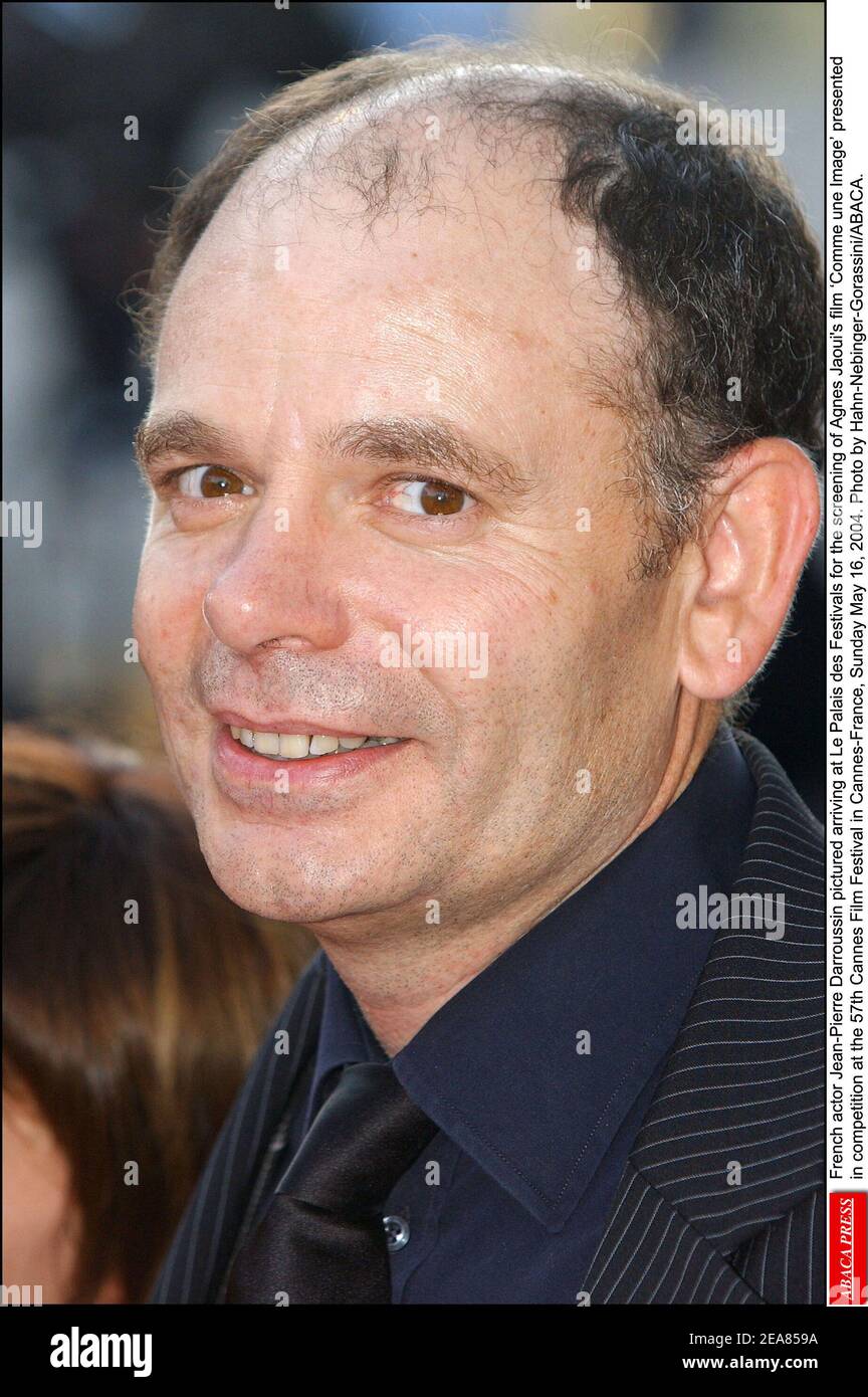 French actor Jean-Pierre Darroussin pictured arriving at Le Palais des Festivals for the screening of Agnes Jaoui's film ïComme une Image' presented in competition at the 57th Cannes Film Festival in Cannes-France, Sunday May 16, 2004. Photo by Hahn-Nebinger-Gorassini/ABACA. Stock Photo