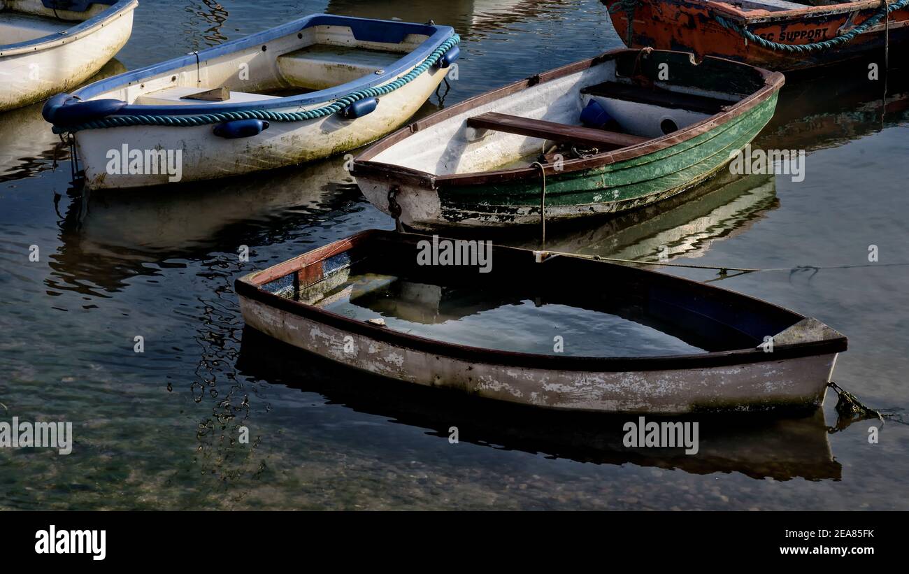 Row boat sinking Stock Photo