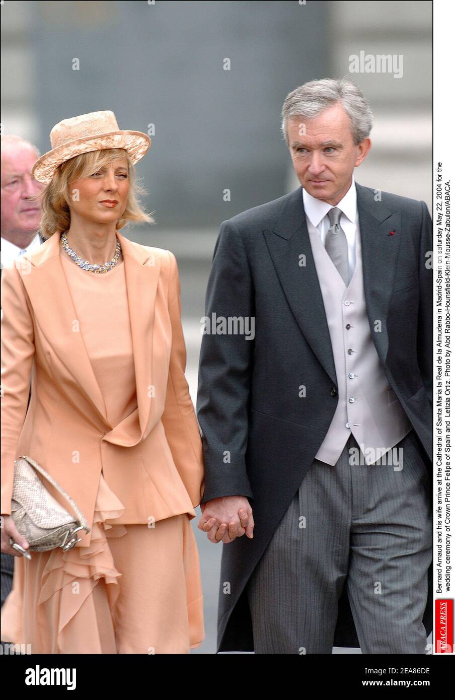 Bernard Arnaud and his wife Helene Mercier Arnault arrive at the Cathedral  of Santa Maria la Real de la Almudena in Madrid-Spain on saturday May 22,  2004 for the wedding ceremony of