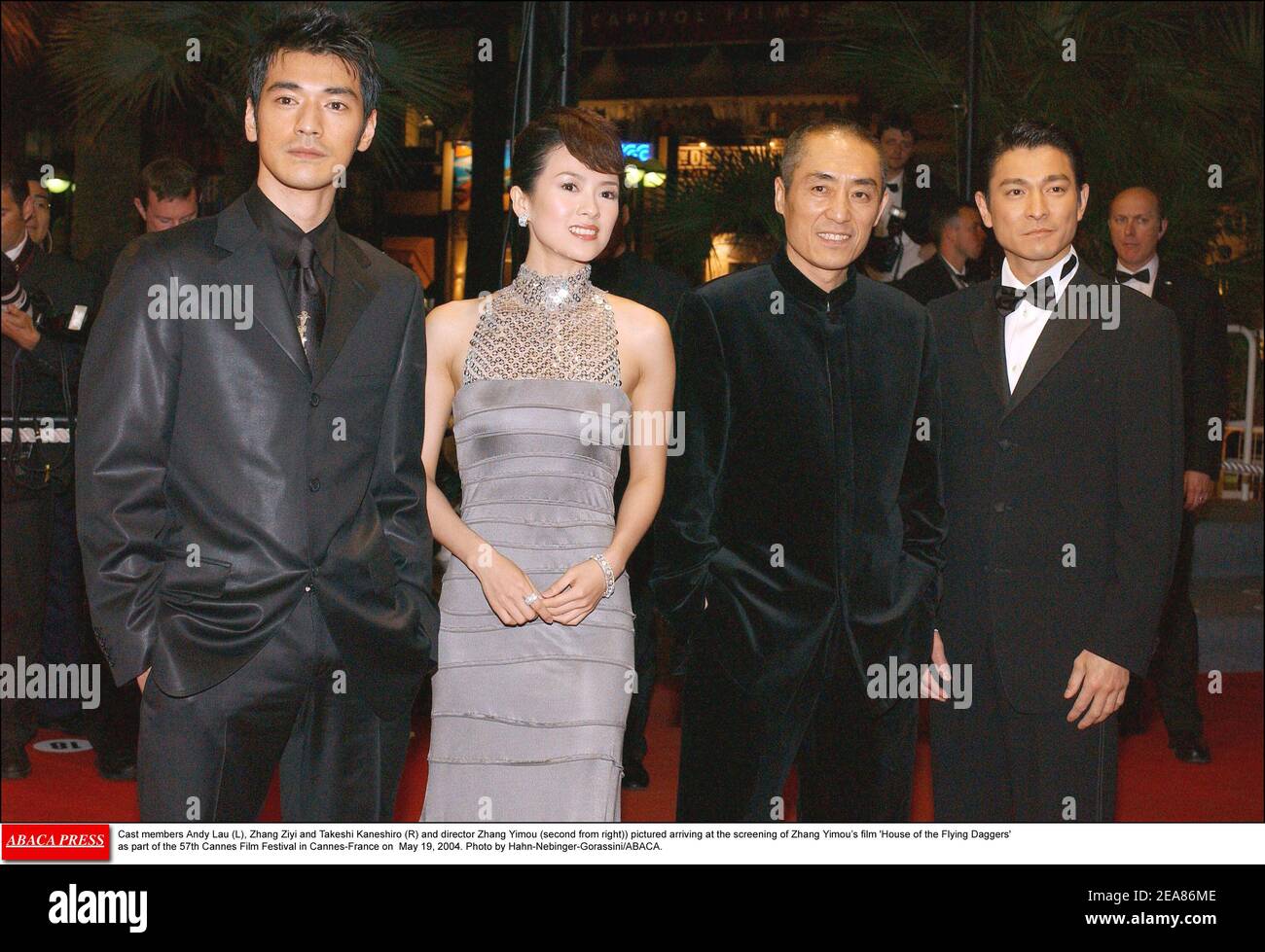Cast members Andy Lau (L), Zhang Ziyi and Takeshi Kaneshiro (R) and director Zhang Yimou (second from right)) pictured arriving at the screening of Zhang Yimou's film 'House of the Flying Daggers' as part of the 57th Cannes Film Festival in Cannes-France on May 19, 2004. Photo by Hahn-Nebinger-Gorassini/ABACA. Stock Photo