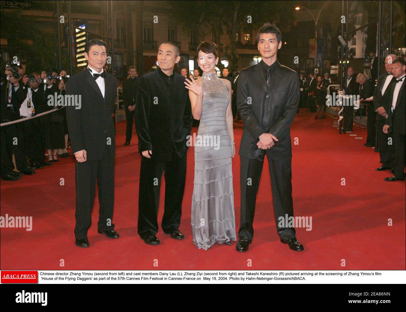 Chinese director Zhang Yimou (second from left) and cast members Dany Lau (L), Zhang Ziyi (second from right) and Takeshi Kaneshiro (R) pictured arriving at the screening of Zhang Yimou's film 'House of the Flying Daggers' as part of the 57th Cannes Film Festival in Cannes-France on May 19, 2004. Photo by Hahn-Nebinger-Gorassini/ABACA. Stock Photo
