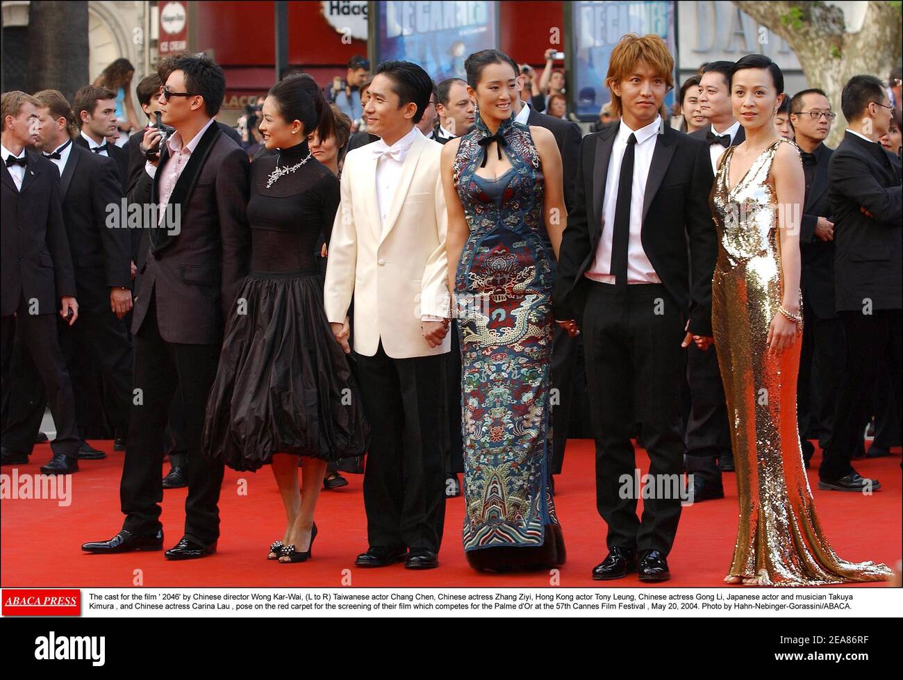 The cast for the film ' 2046' by Chinese director Wong Kar-Wai, (L to R) Taiwanese actor Chang Chen, Chinese actress Zhang Ziyi, Hong Kong actor Tony Leung, Chinese actress Gong Li, Japanese actor and musician Takuya Kimura , and Chinese actress Carina Lau , pose on the red carpet for the screening of their film which competes for the Palme d'Or at the 57th Cannes Film Festival , May 20, 2004. Photo by Hahn-Nebinger-Gorassini/ABACA. Stock Photo