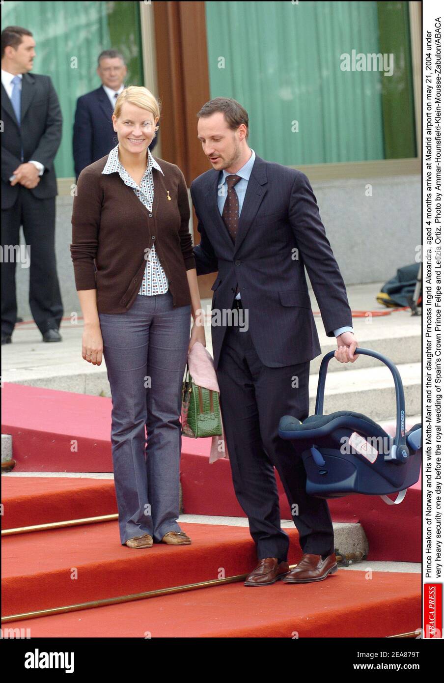 Prince Haakon of Norway and his wife Mette-Marit and their daughter Princess Ingrid Alexandra, aged 4 months arrive at Madrid airport on may 21, 2004 under very heavy security one day before the royal wedding of Spain's Crown Prince Felipe and Letizia Ortiz. Photo by Ammar-Hounsfield-Klein-Mousse-Zabulon/ABACA Stock Photo