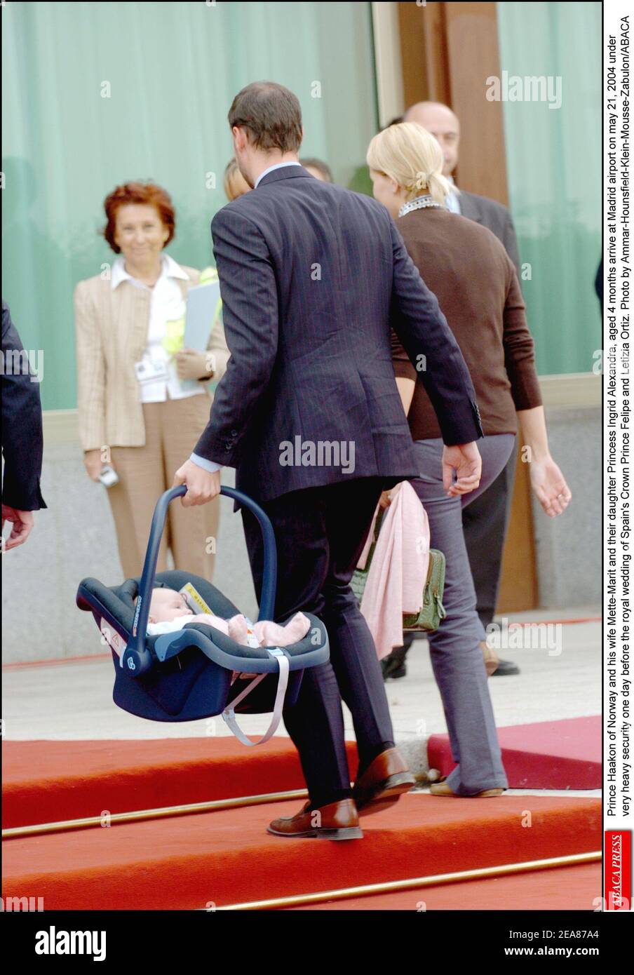 Prince Haakon of Norway and his wife Mette-Marit and their daughter Princess Ingrid Alexandra, aged 4 months arrive at Madrid airport on may 21, 2004 under very heavy security one day before the royal wedding of Spain's Crown Prince Felipe and Letizia Ortiz. Photo by Ammar-Hounsfield-Klein-Mousse-Zabulon/ABACA Stock Photo