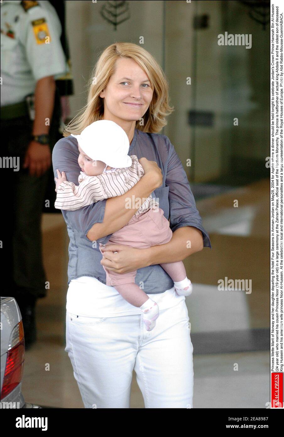 Princess Mette-Marit of Norway and her daughter departing the hotel Four Seasons in Amman-Jordan on May28, 2004 for Aqaba where a dinner should be held tonight to celebrate Jordan's Crown Prince Hamzah Bin Al-Hussein (24 year old) who married his cousin Princess Noor (19 year old) in a large ceremony at the Zahran Palace, official seat of the Hachem Monarchy. The prince is halfbrother of actual king Abdala II and the oldest son of deceased King Hussein and his american wife princess Noor Al-Hussein. At the celebration local and international personalities and a large representation of the Roya Stock Photo