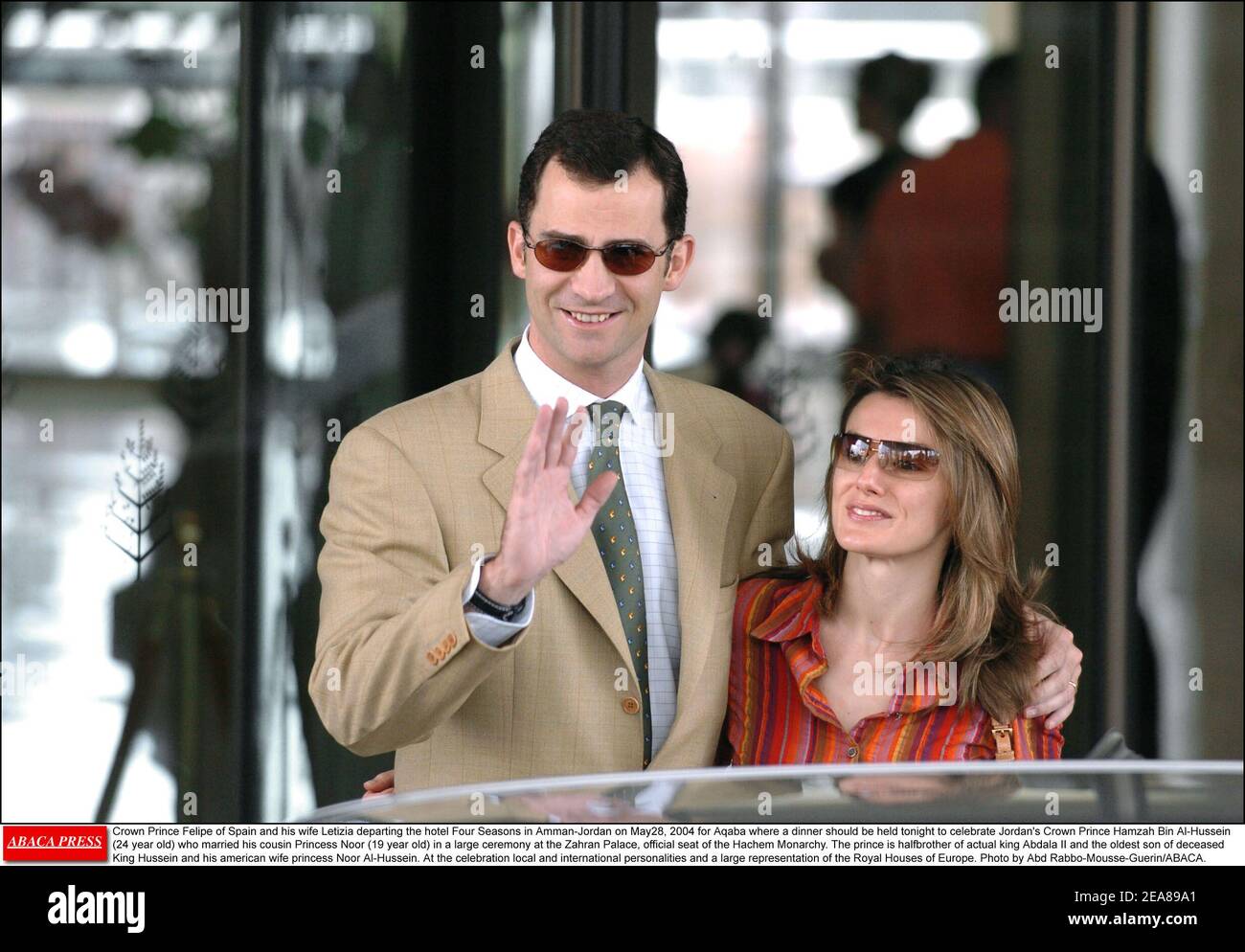 Crown Prince Felipe of Spain and his wife Letizia departing the hotel Four Seasons in Amman-Jordan on May28, 2004 for Aqaba where a dinner should be held tonight to celebrate Jordan's Crown Prince Hamzah Bin Al-Hussein (24 year old) who married his cousin Princess Noor (19 year old) in a large ceremony at the Zahran Palace, official seat of the Hachem Monarchy. The prince is halfbrother of actual king Abdala II and the oldest son of deceased King Hussein and his american wife princess Noor Al-Hussein. At the celebration local and international personalities and a large representation of the Ro Stock Photo