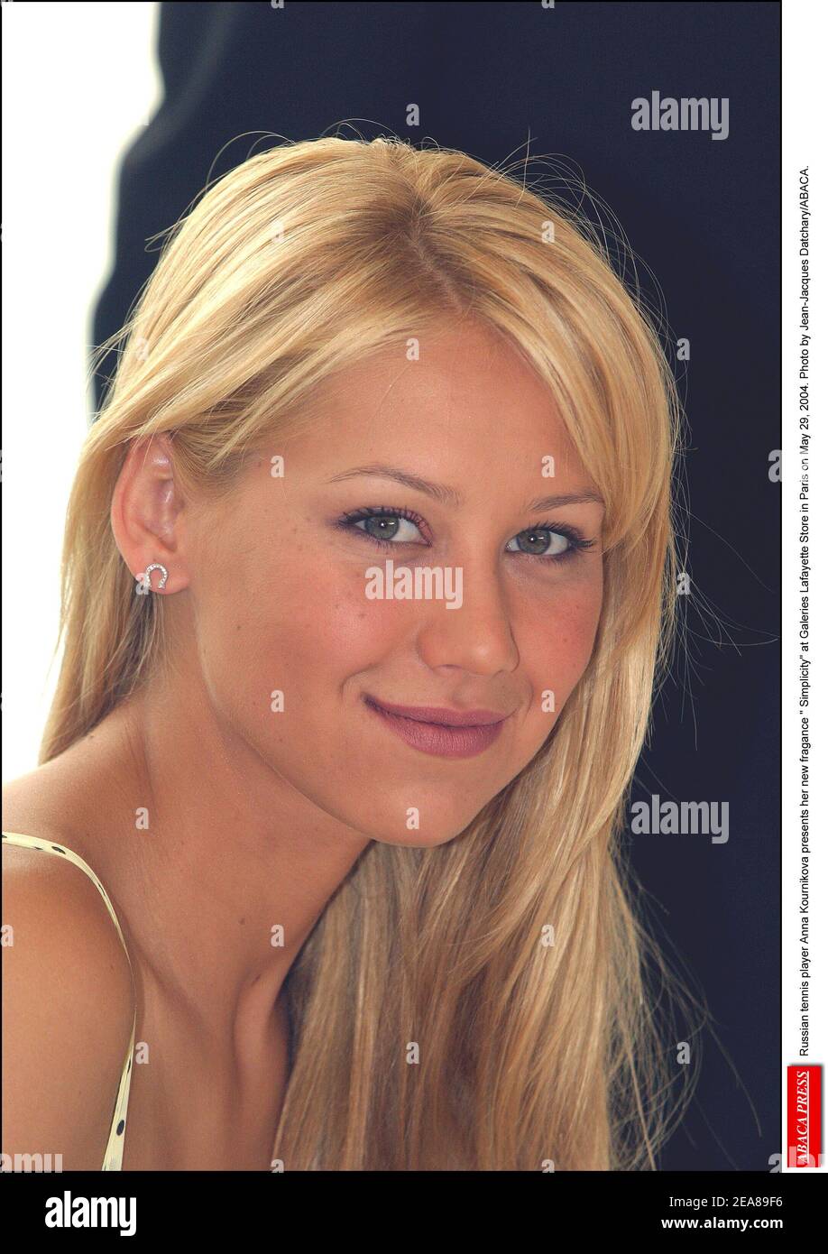 Russian tennis player Anna Kournikova presents her new fragance Simplicity at Galeries Lafayette Store in Paris on May 29, 2004. Photo by Jean-Jacques Datchary/ABACA. Stock Photo