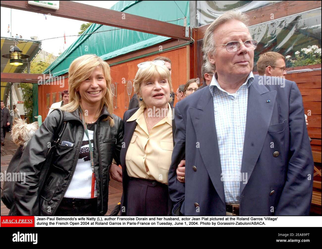 Jean-Paul Belmondo's wife Natty (L), author Francoise Dorin and her  husband, actor Jean Piat pictured at the Roland Garros 'Village' during the  French Open 2004 at Roland Garros in Paris-France on Tuesday,