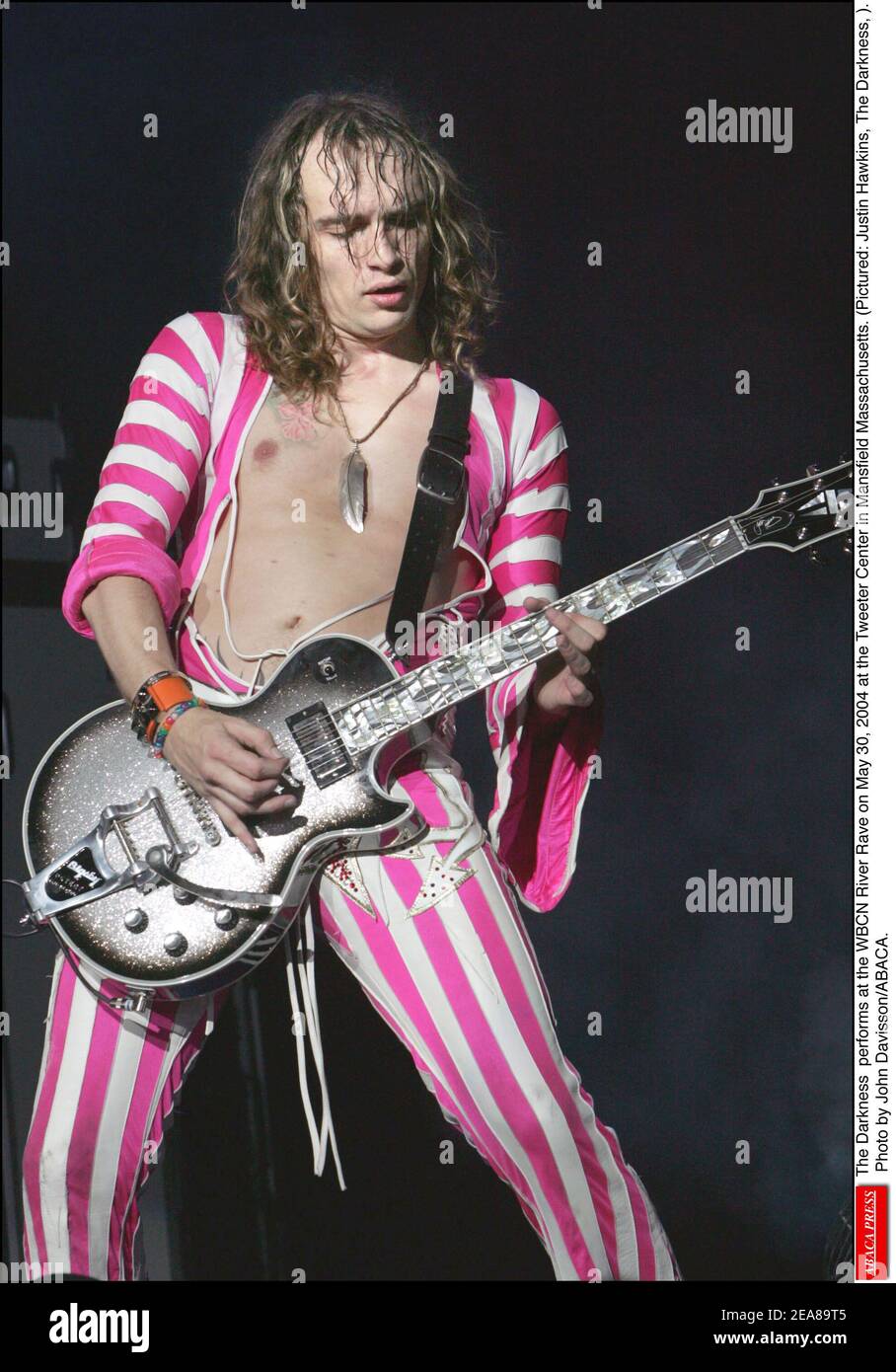 The Darkness performs at the WBCN River Rave on May 30, 2004 at the ...