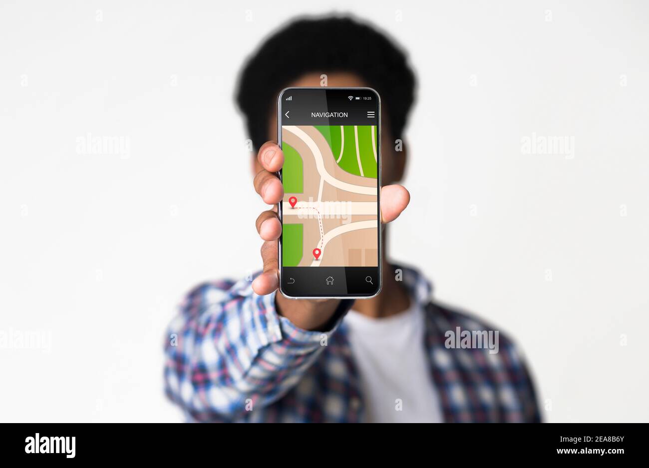 African Guy Showing Smartphone With GPS Navigator Over White Background ...