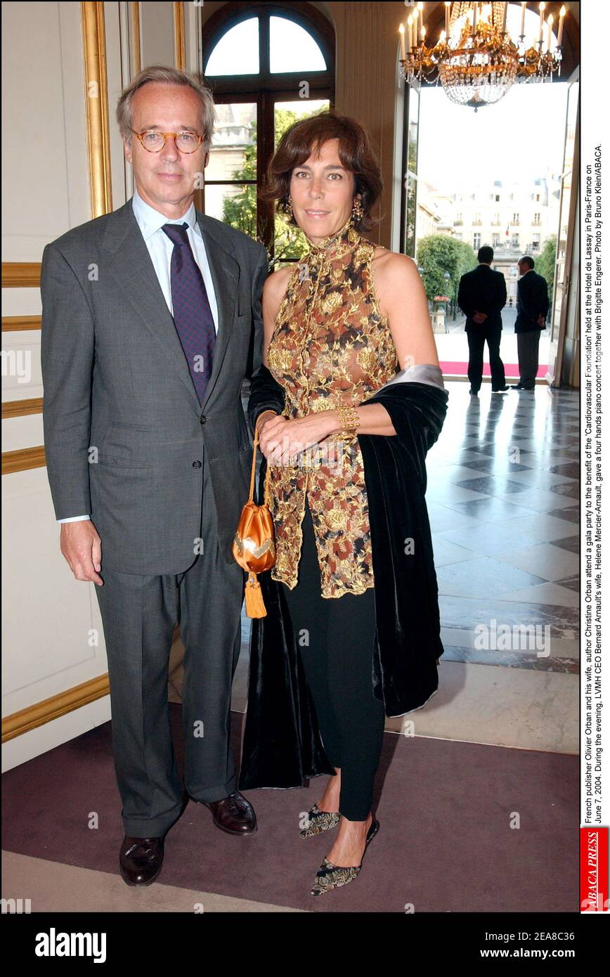 French publisher Olivier Orban and his wife, author Christine Orban attend a gala party to the benefit of the 'Cardiovascular Foundation' held at the Hotel de Lassay in Paris-France on June 7, 2004. During the evening, LVMH CEO Bernard Arnault's wife, Helene Mercier-Arnault, gave a four hands piano concert together with Brigitte Engerer. Photo by Bruno Klein/ABACA. Stock Photo