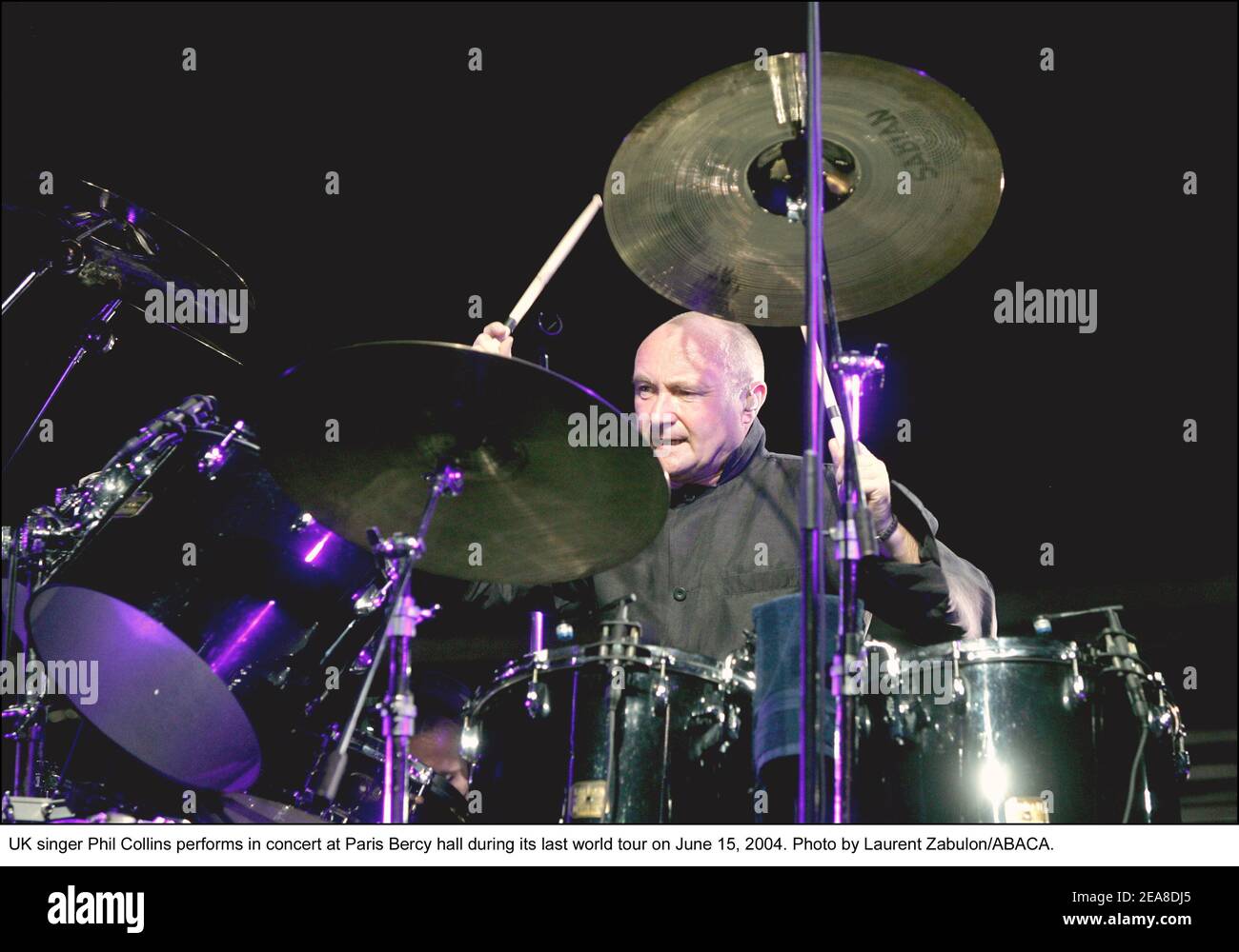 UK singer Phil Collins performs in concert at Paris Bercy hall during