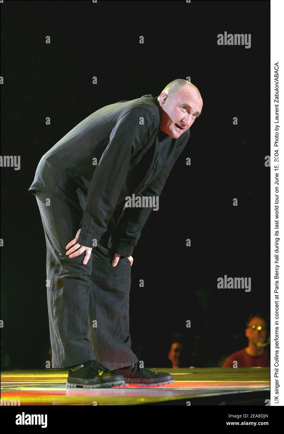 UK singer Phil Collins performs in concert at Paris Bercy hall during