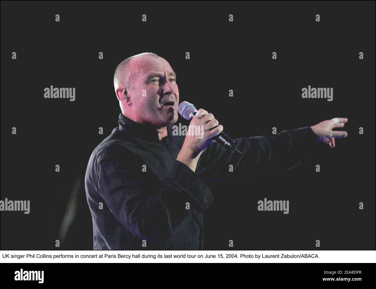 UK singer Phil Collins performs in concert at Paris Bercy hall during
