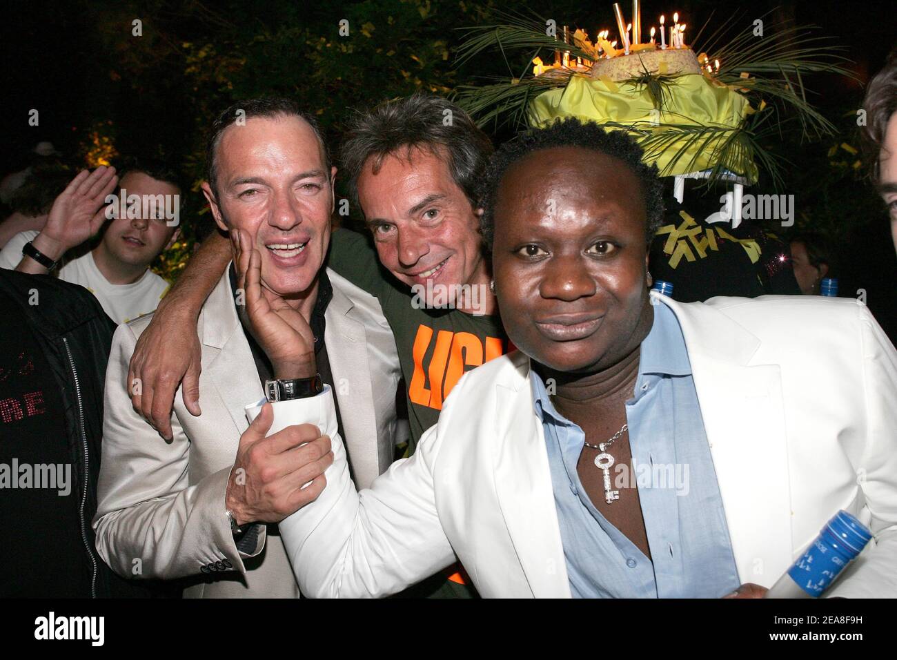 From L to R : Tony Gomez, Basile de Koch and Magloire attend his birthday bash at l'Etoile in Paris on June 25, 2004. Photo by Laurent Zabulon/ABACA. Stock Photo