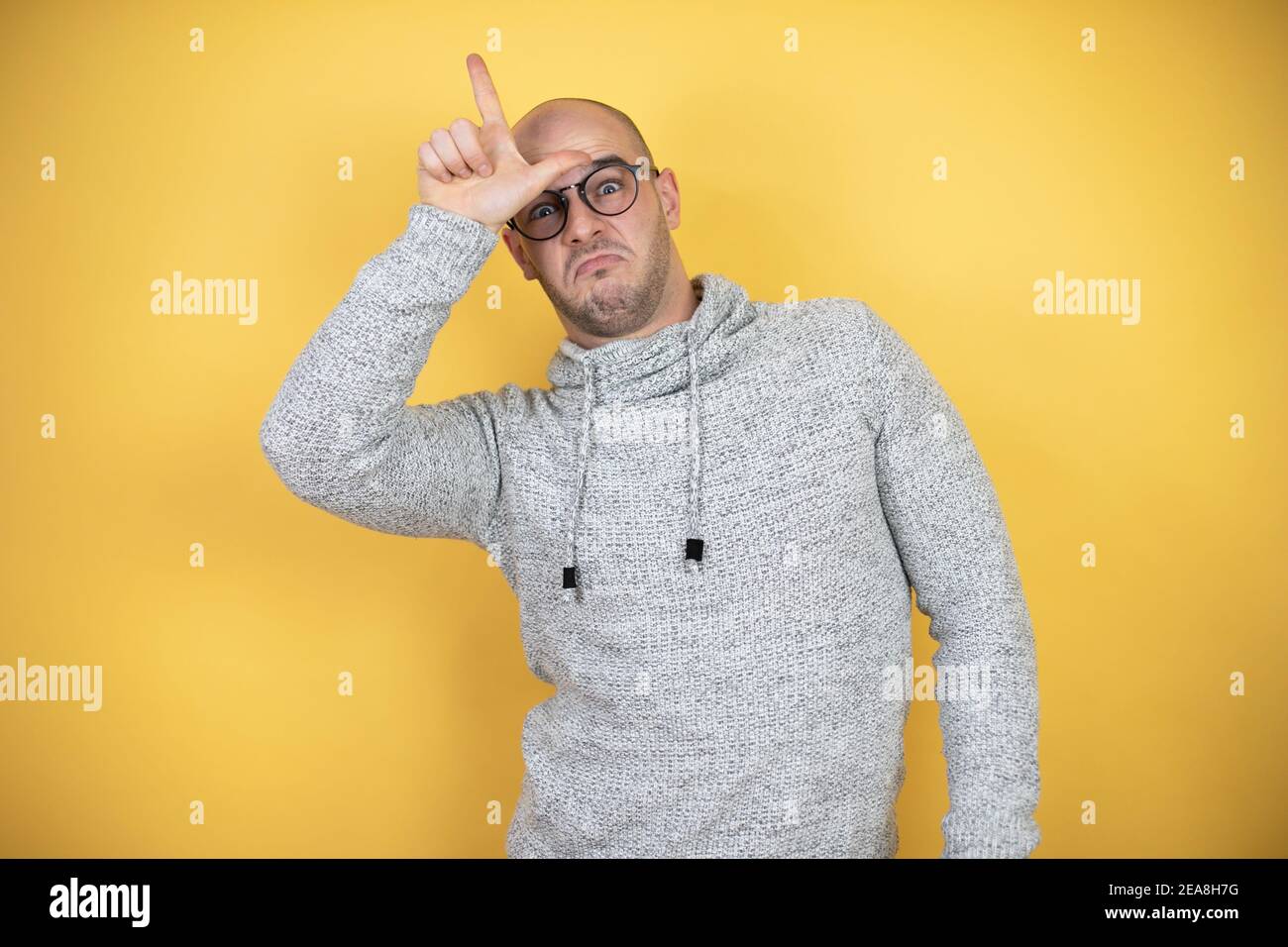 Bald man making funny face hi-res stock photography and images - Alamy