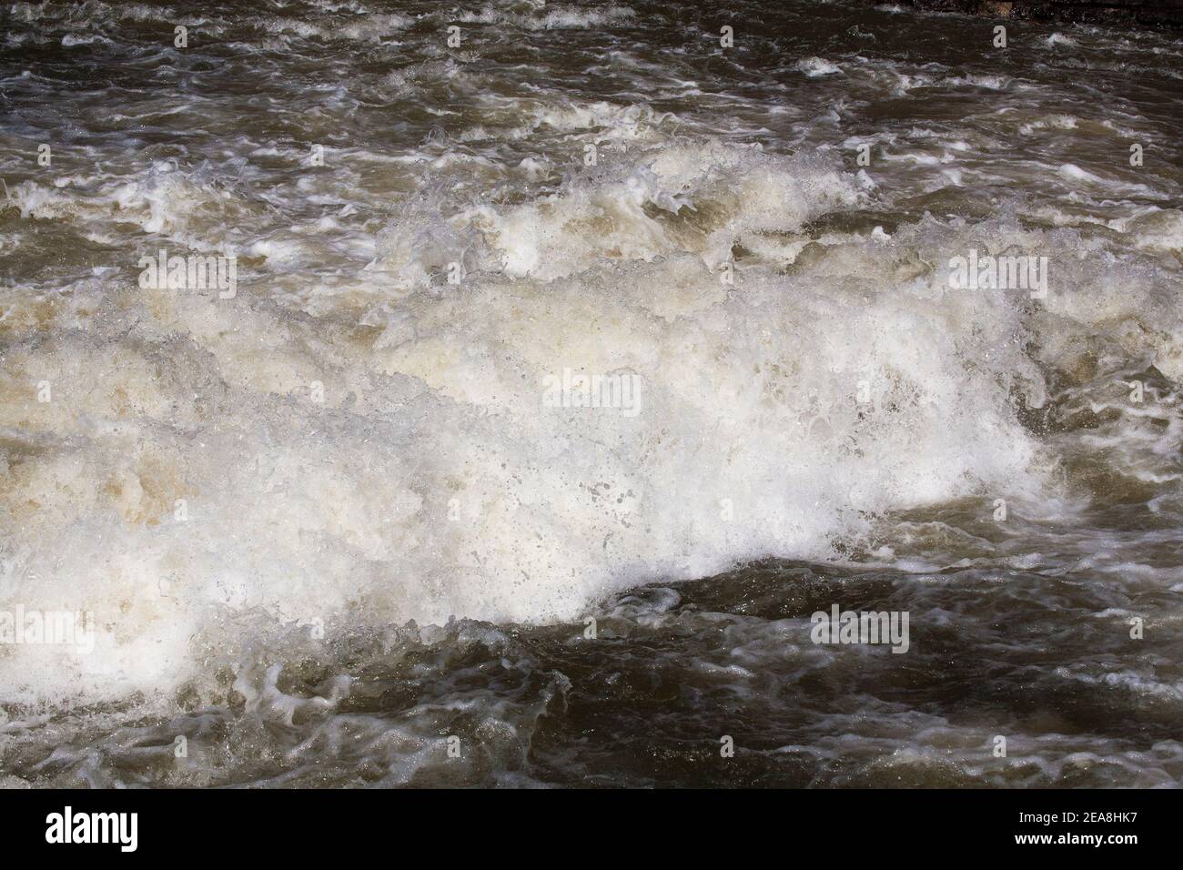 RUSHING masses of WATER in the river Stock Photo