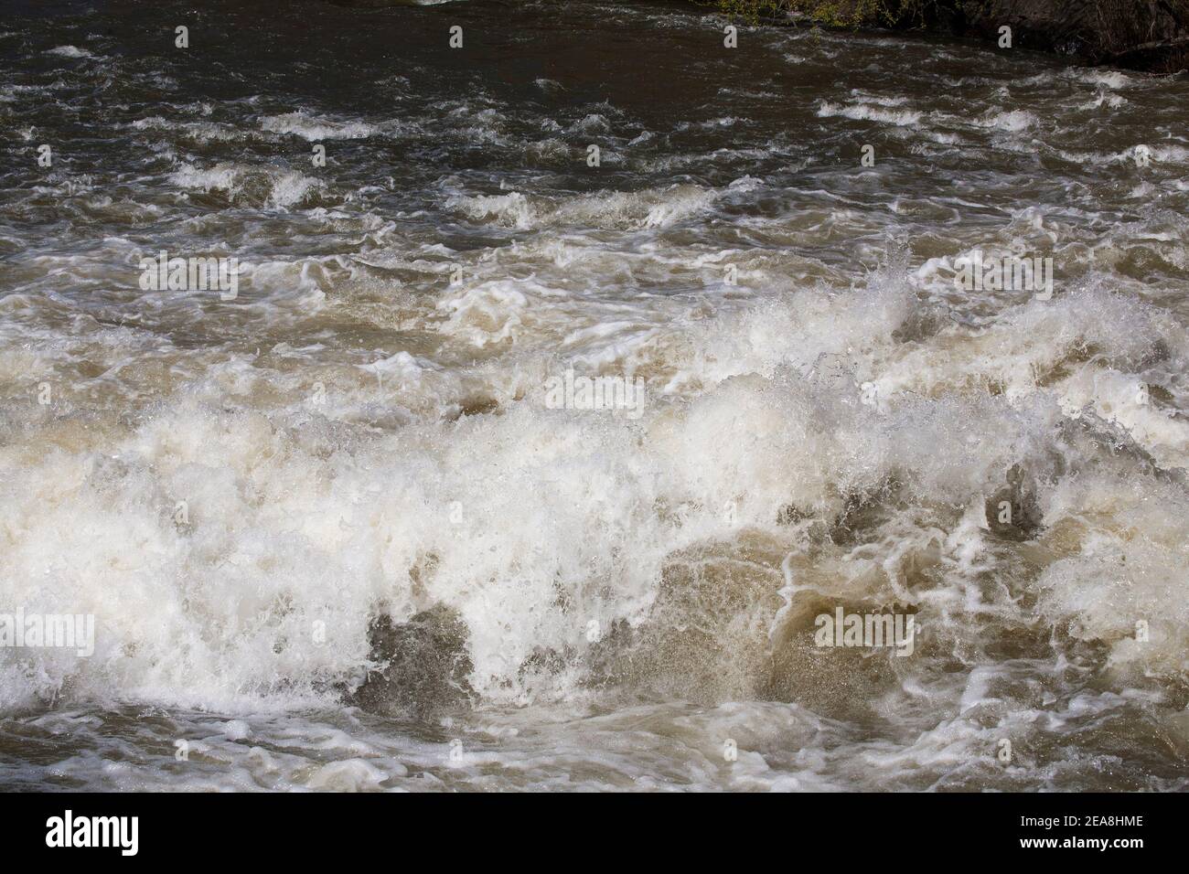 RUSHING masses of WATER in the river Stock Photo