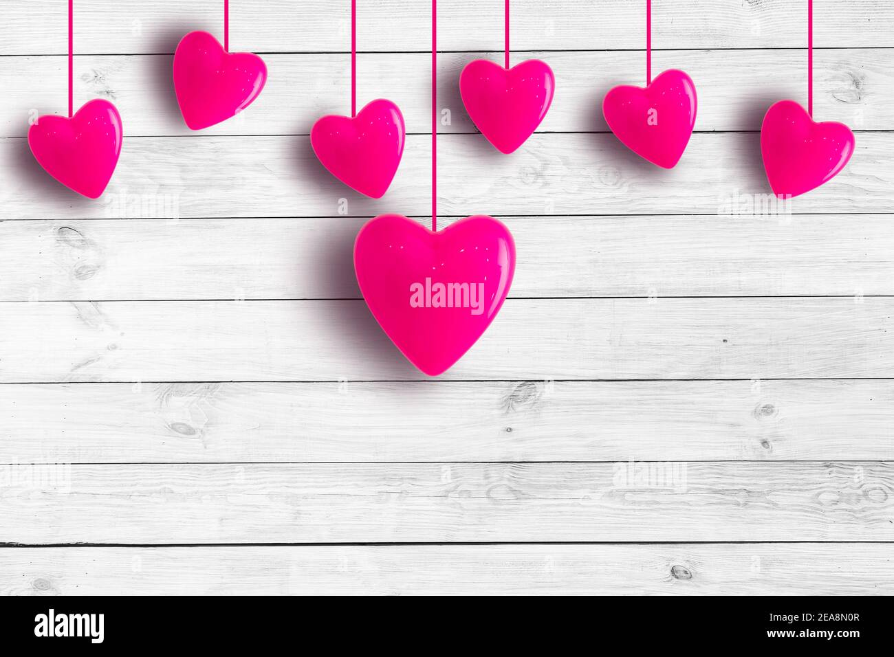 Valentine's day background with red hearts on wooden planks Stock Photo ...
