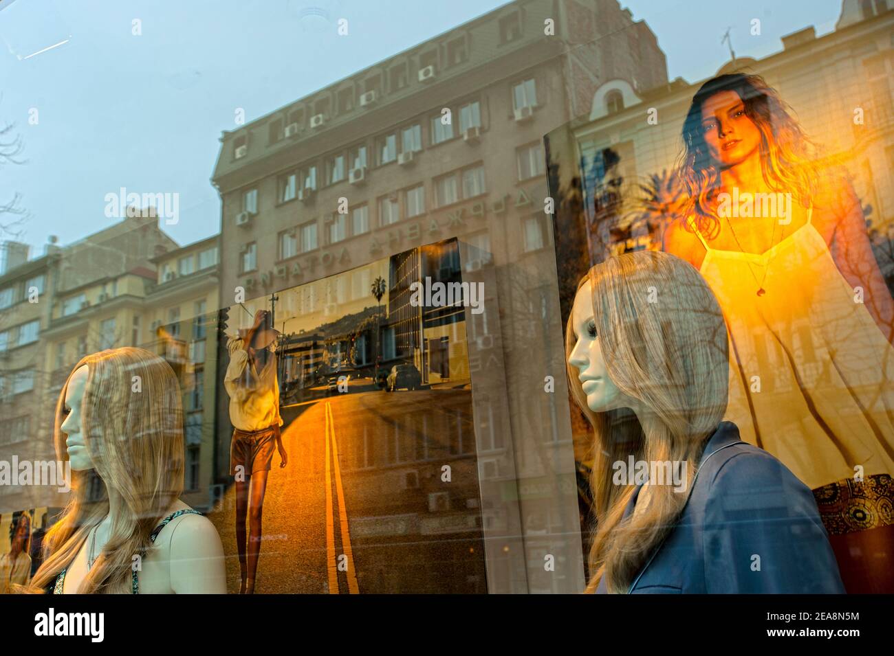 Fashion store window with street scene reflection, Sofia, Bulgaria Stock Photo