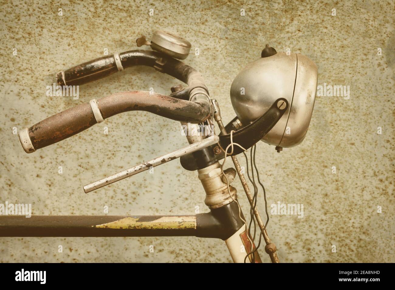 Retro styled side view of an antique bicycle with old headlight Stock Photo