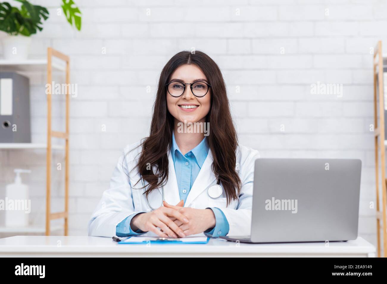 Young professional, medical worker and family therapist, health care and visit to doctor Stock Photo