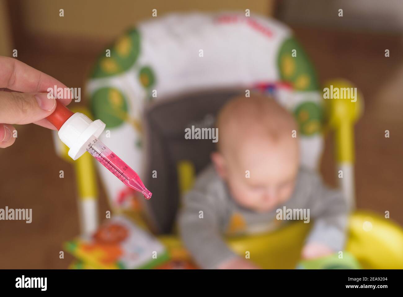 Hand feeding with a syringe hires stock photography and images Alamy