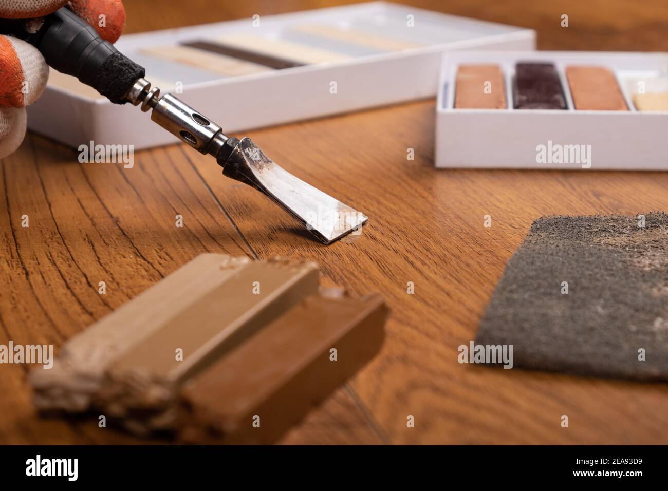 floor restoration with wax,repair of defects on laminate, parquet Stock