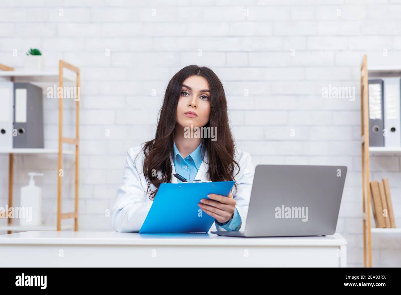 Listen to patient complaints, visit to therapist in modern clinic Stock Photo