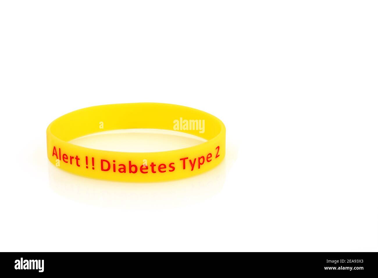 Diabetes type 2 alert wristband in yellow rubber silicone with red type on  white background Stock Photo - Alamy