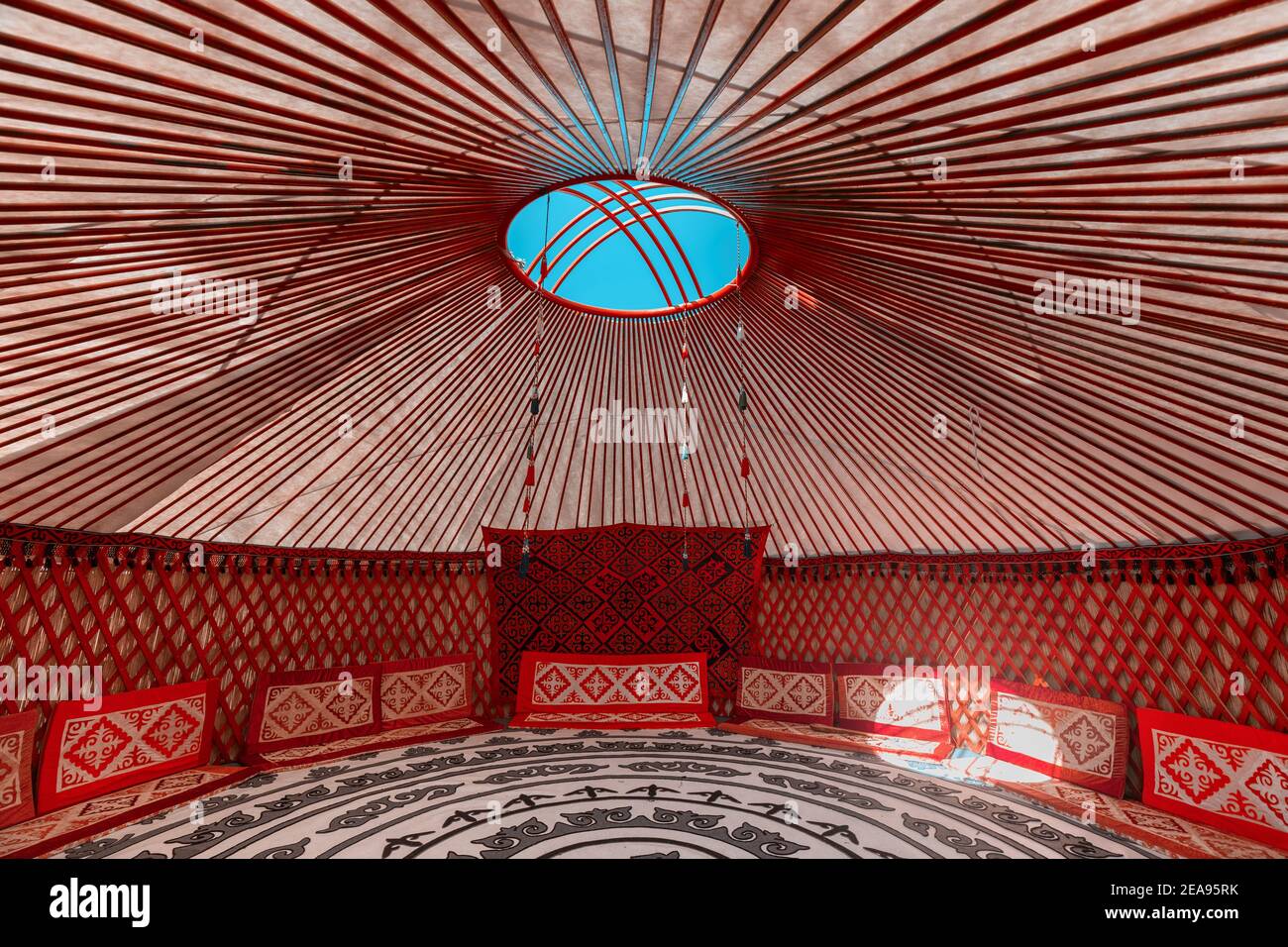 Interior of a Yurt. It is a portable tent house in the culture of Central Asian nomadic peoples. Ethnic and folk patterns for home decoration Stock Photo