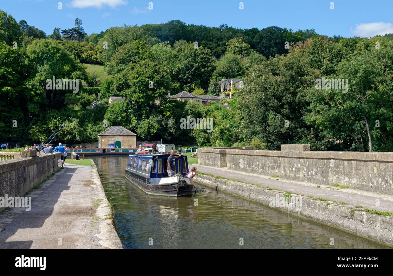 Barge navigating the Dundas Aqueduct which carries the Kennet and Avon Canal over the River Avon, near Limpley Stoke, Wiltshire / Somerset border, UK, Stock Photo
