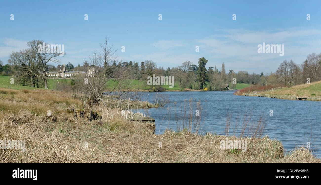 Bowood House and Park with ornamental lake, landscaped by Capability Brown, Derry Hill, Wiltshire, UK, March. Stock Photo